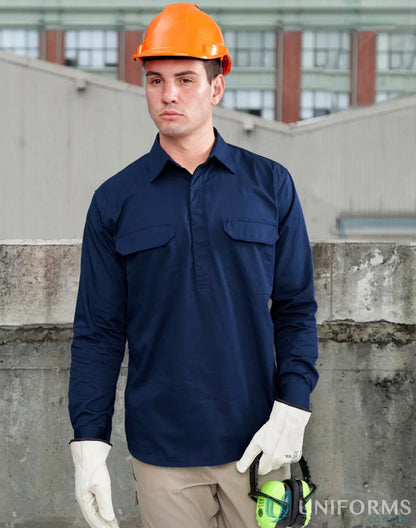 Construction worker wearing Unisex Cool Breeze Closed Front-LS Work Shirt showing safety gear