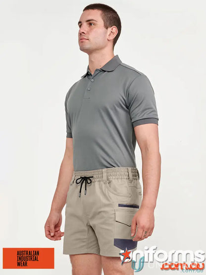 Man in gray polo and khaki shorts showcasing Unisex Cotton Stretch Cuffed Shorts