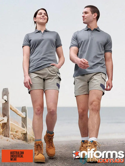 Two people wearing matching unisex cotton stretch drill workwear for WP29 unisex cotton line