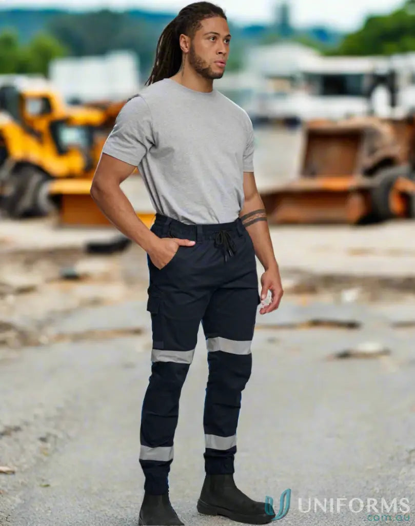 Man in cotton stretch drill cuffed work pants WP28HV for tough jobs