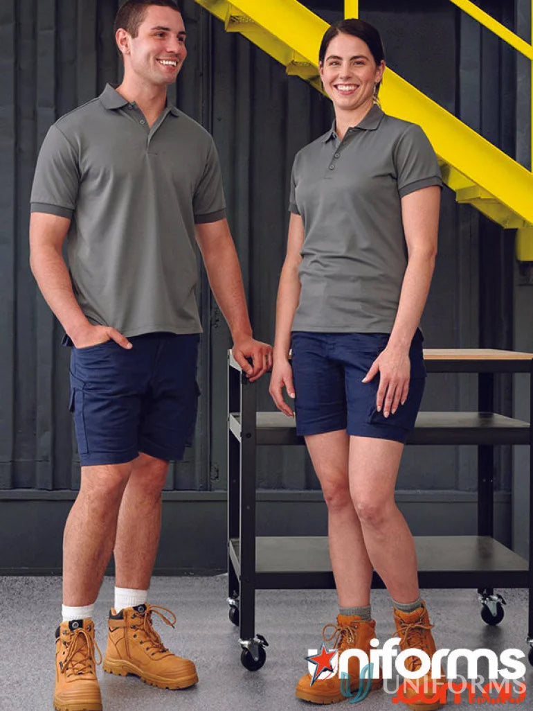 Two people wearing matching WP27 Unisex Cotton Stretch Rip Stop Work Shorts outdoors