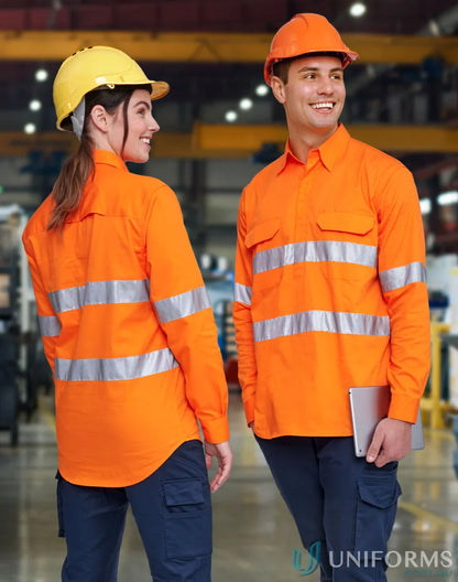 Two construction workers in safety gear wearing hi-vis cool breeze long sleeve shirts