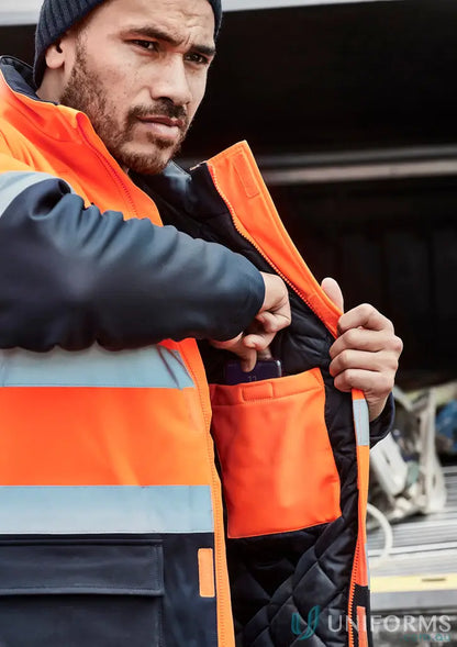 Unisex HiVis Antarctic Softshell Jacket with fleece-lined hand warmers and high visibility