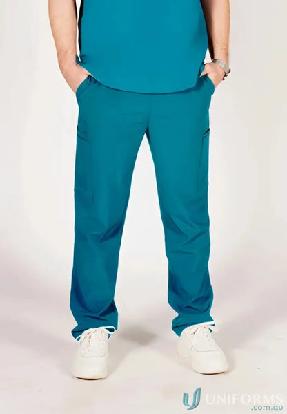 Teal unisex scrub pants with white sneakers for a professional and comfy look