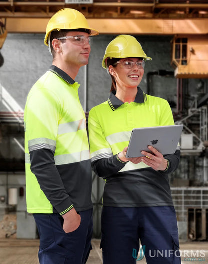 Two construction workers in safety gear wearing Unisex Segmented LS Polo with winning spirit Spirit SW86