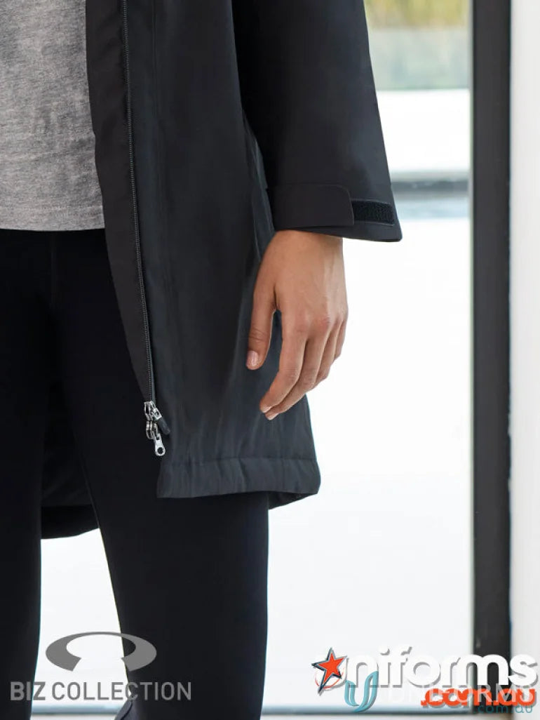 Black softshell jacket with waterproof features in the Unisex Sphere Jacket made of recycled polyester lining