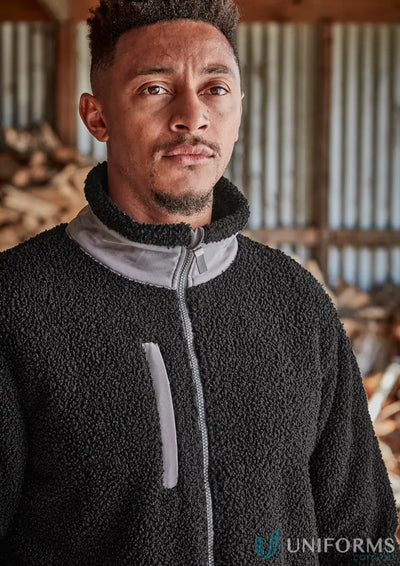 Man in black zip sherpa fleece jacket with grey collar and chest pocket, super warm style