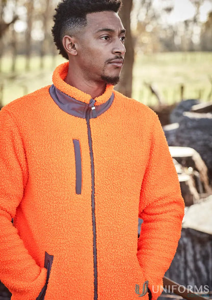 Man in orange zip sherpa fleece zt285 jacket with grey accents and pockets