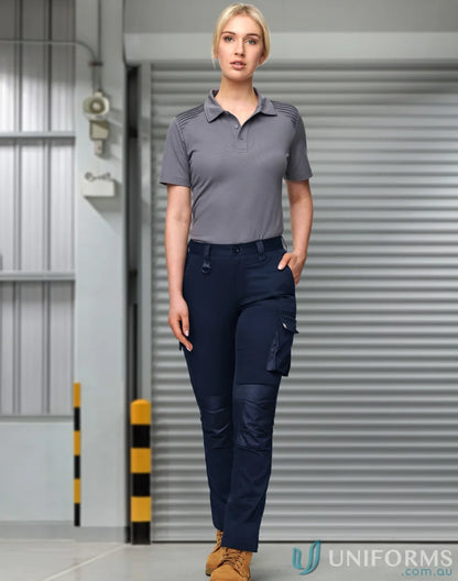 Women’s grey polo shirt with navy utility stretch cargo work pants for comfort