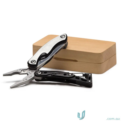 VersaGrip Multi Tool with stainless steel 420J2 drop blade and pliers on wooden box