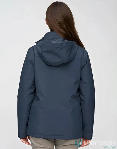 Person wearing Vic Metro Waterproof Quilted Jacket from behind in dark blue