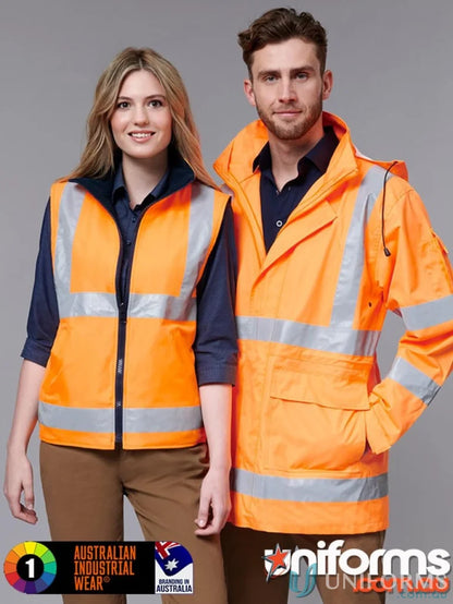 Two people in high-vis orange safety gear with VIC Rail 3in1 safety jacket and vest
