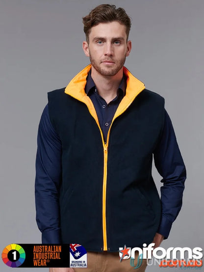 Man modeling VIC Rail Reversible Safety Vest with navy blue polar fleece and yellow collar