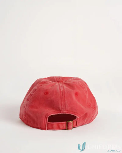 Red baseball cap with adjustable strap and buckle, cotton material.