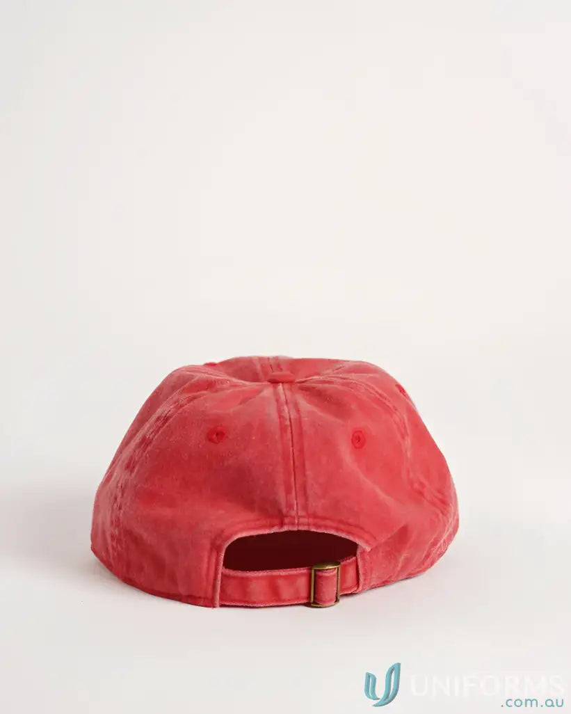 Red baseball cap with adjustable strap and buckle, cotton material.