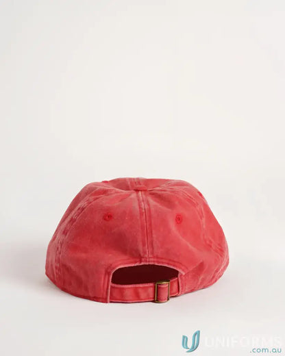 Faded red vintage washed cap with brass buckle closure for a cool vintage look