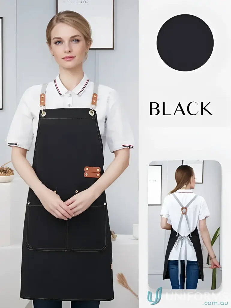 Black waterproof canvas kitchen apron with brown leather accents and front pockets
