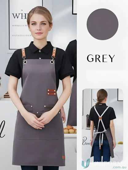 Grey waterproof canvas kitchen apron with brown leather straps and pockets in vibrant colours