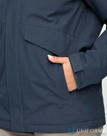 Dark blue Waterproof Quilted Jacket with zippered pocket and adjustable cuffs for stay dry workwear