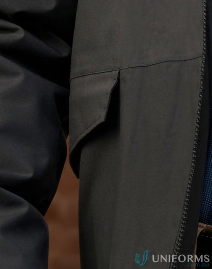 Dark green waterproof quilted jacket with pocket flap and zipper for stay dry workwear