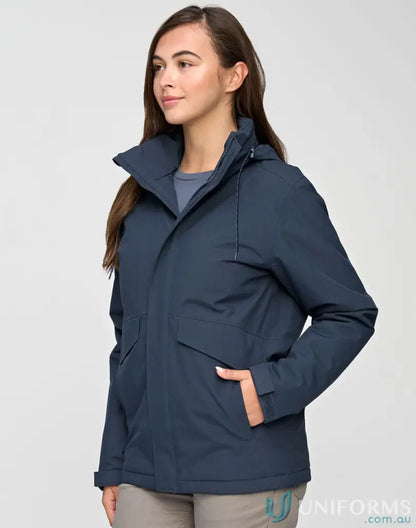 Woman in Waterproof Quilted Jacket staying dry, perfect workwear for uniforms and outdoor fun