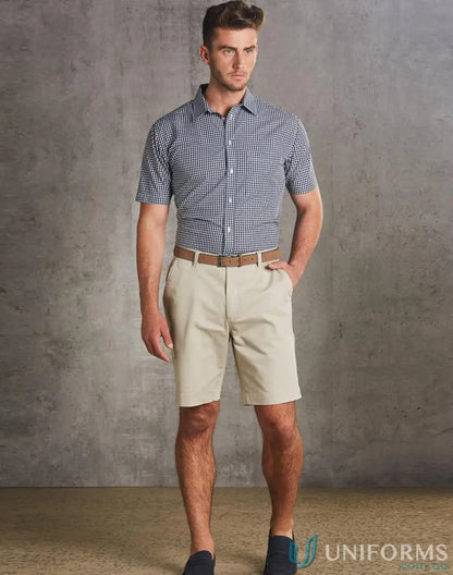 Man wearing spirit chino shorts in blue and white gingham for all-day comfort