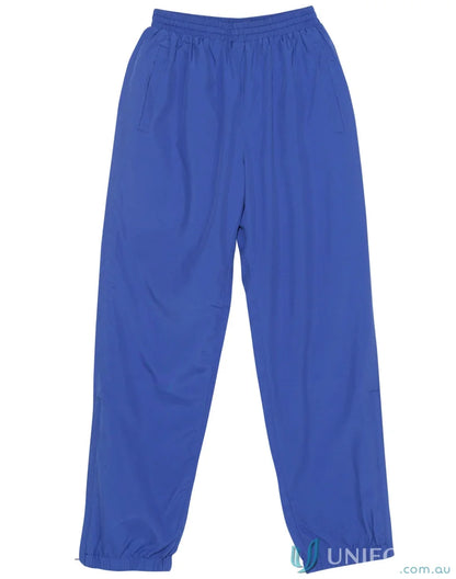Winning Spirit Kids Legend Warm Up Pants with zip-up leg openings in blue athletic style