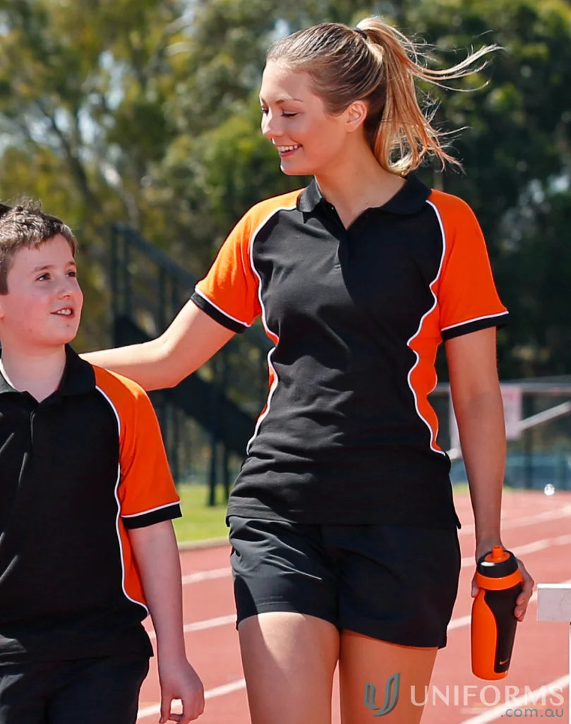 Winning Spirit Ladies Arena Polo in black and orange with truedry pique fabric