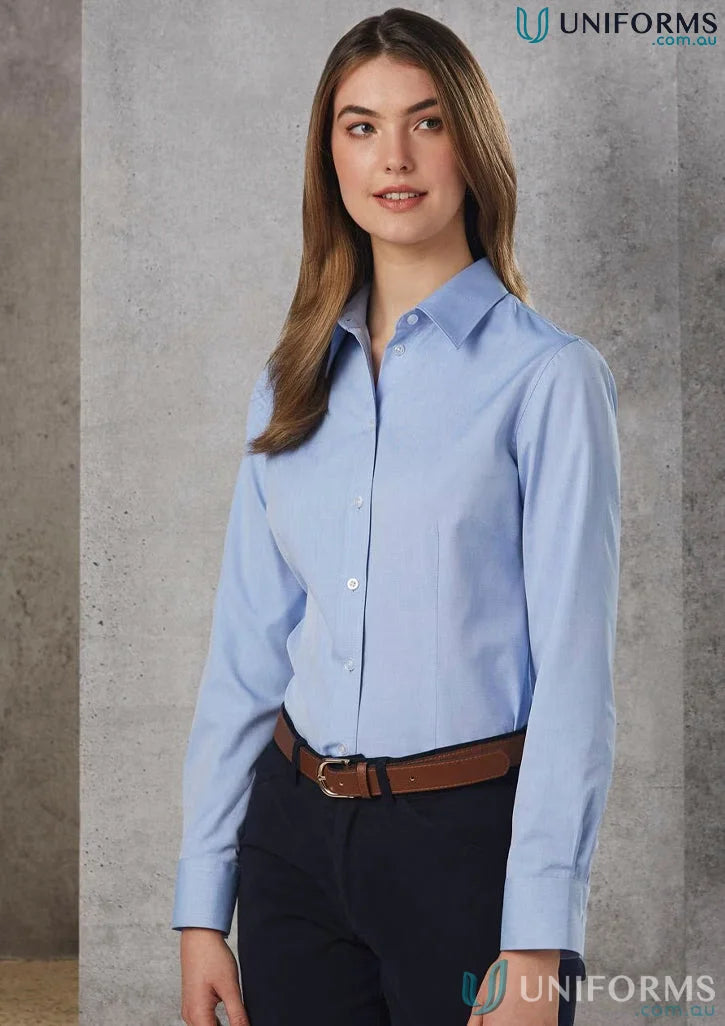 Winning Spirit Ladies CVC Oxford L/S Shirt in light blue with dark trousers and brown belt