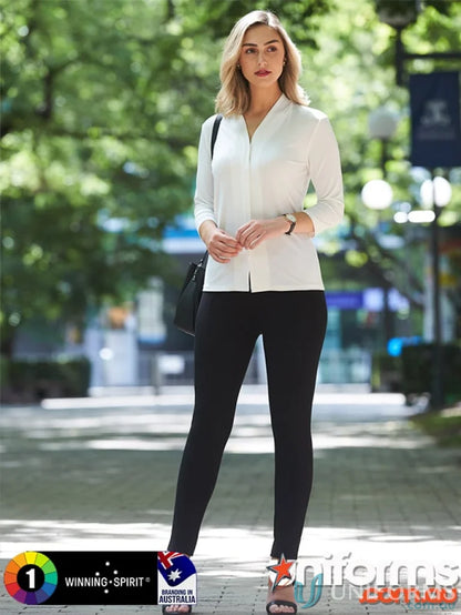 Woman in white blouse and black leggings wearing Winning Spirit Ladies London Treggings