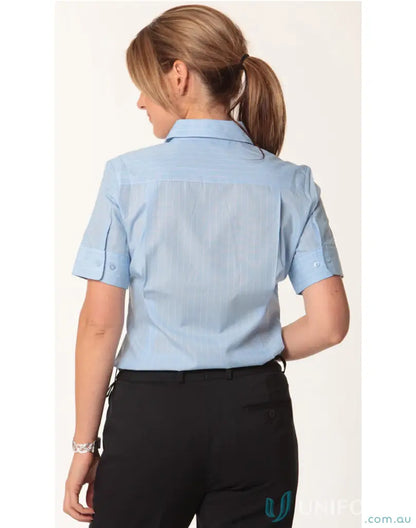 Woman wearing Winning Spirit Ladies PinStripe SS Shirt with stripe short sleeve in blue and black