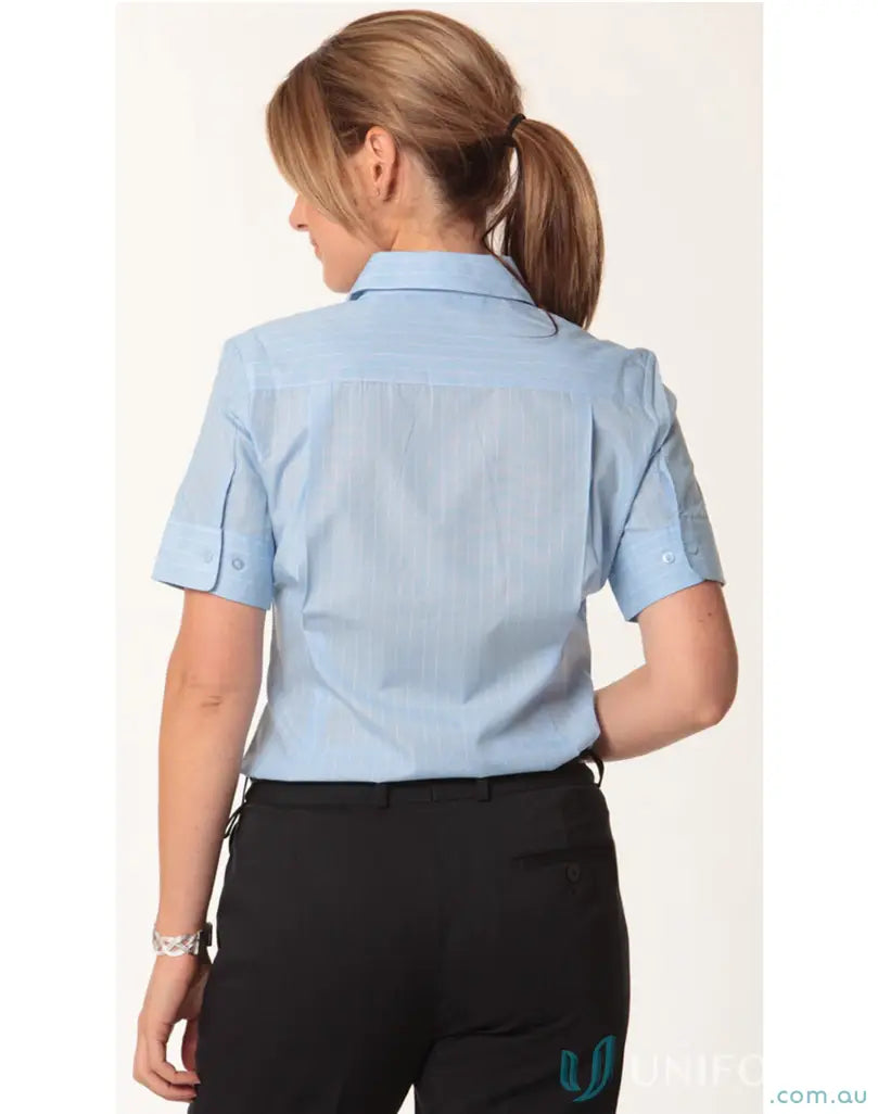 Woman wearing Winning Spirit Ladies PinStripe SS Shirt with stripe short sleeve in blue and black