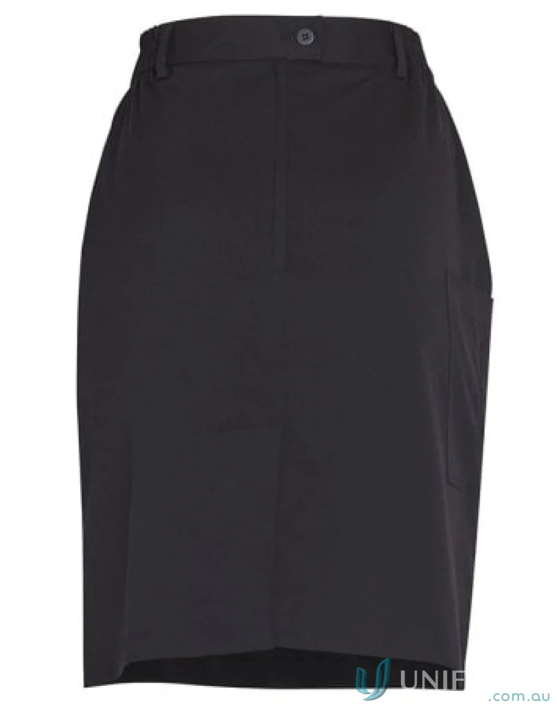 Winning Spirit Ladies Utility Cargo Skirt in black with knee-length pencil style and single button closure, made from 2-way stretch fabric