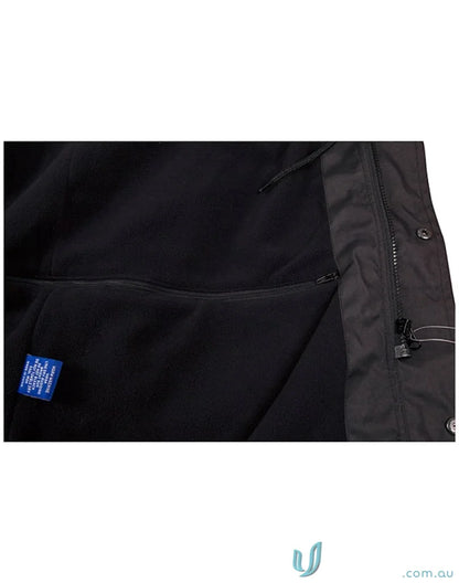 Interior view of Winning Spirit Longline Stadium Jacket with zippered pocket and high wind collar