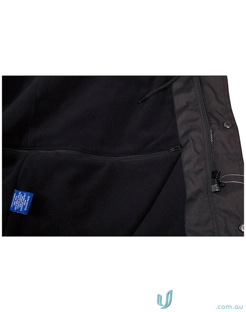 Interior view of Winning Spirit Longline Stadium Jacket with zippered pocket and high wind collar