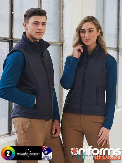 Two people showing off navy jk29 padded vest with zippered welt pockets in nylon rip-stop fabric
