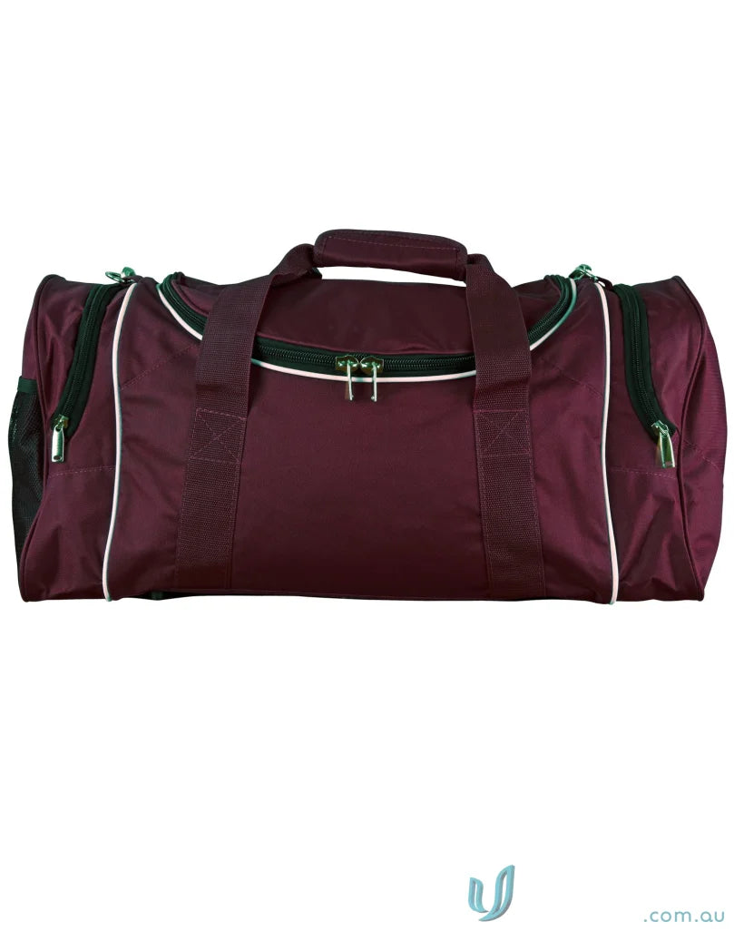 Maroon winner sports bag shown as a travel bag for the B2020 Winner Sports collection