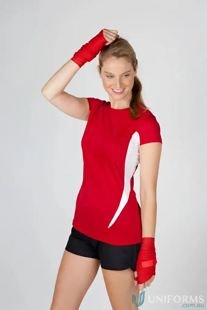 Woman in red women’s accelerator cool-dry t-shirt for active comfort