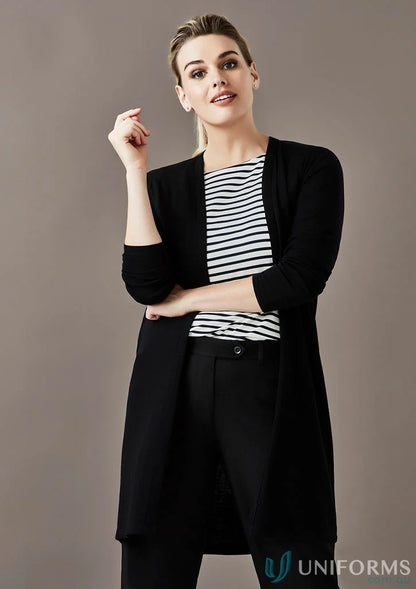 Woman wearing women’s Chelsea long line cardigan RLC970L over striped top and black trousers