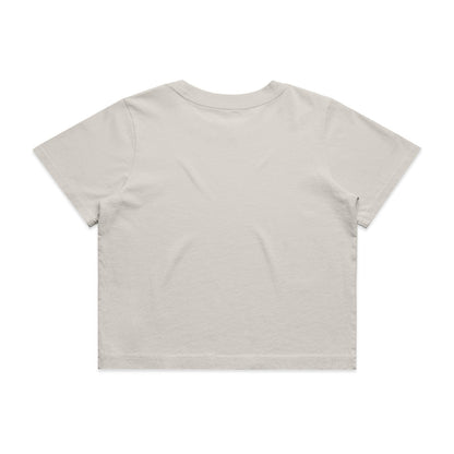 Women’s faded crop tee in white with short sleeves and pocket detail