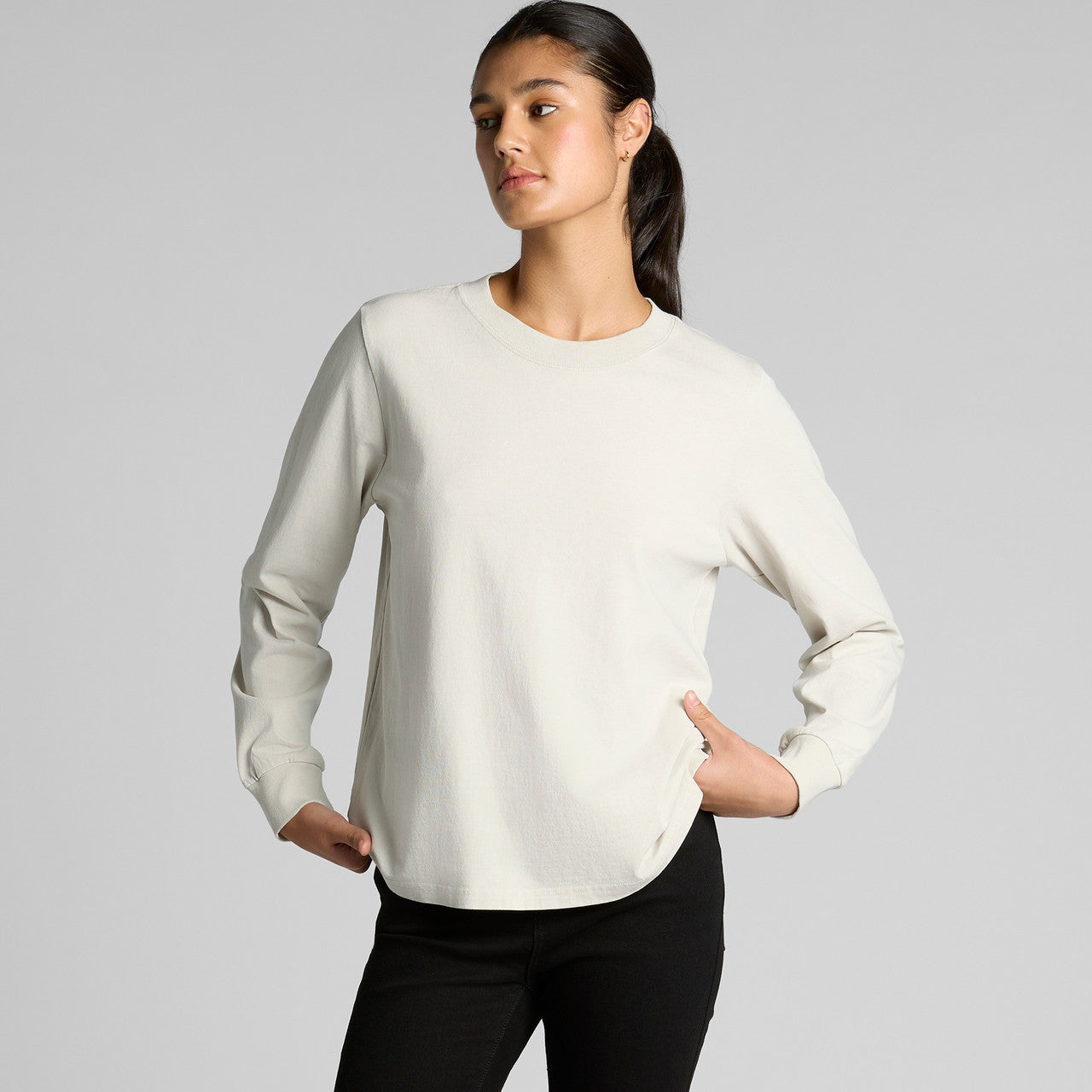 Cream-colored faded long sleeve tee with black leggings