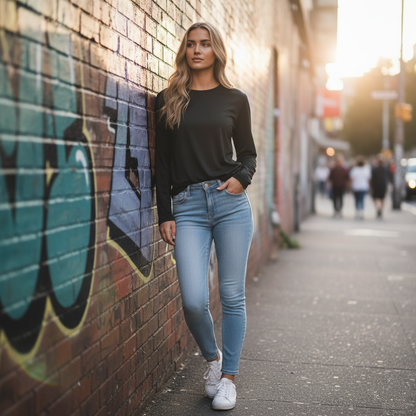 Women’s Maple Active long sleeve tee with white sneakers and blue jeans