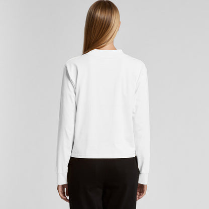 White long-sleeved cardigan with black buttons and a round neckline.