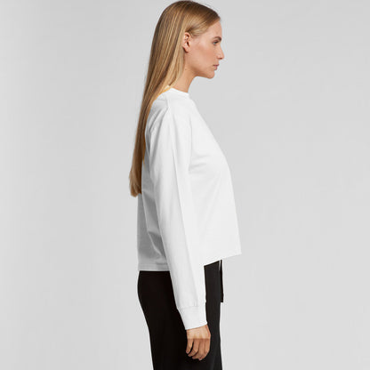 White cropped sweatshirt with long sleeves and ribbed cuffs, made of fleece material.