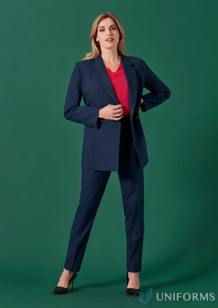 Womens Renew Mid-Waist Slim Leg Pant worn with dark blue pantsuit and red top