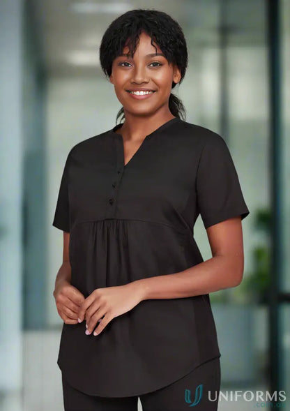 Woman in black V-neck rose tunic scrub top with silverplus antibacterial treatment