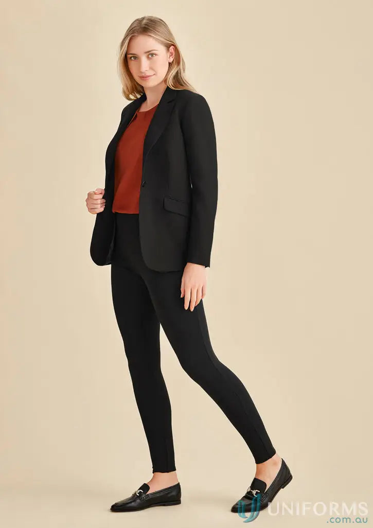 Woman modeling Womens Scuba Ponte High-Rise Corporate Legging with black blazer and rust top