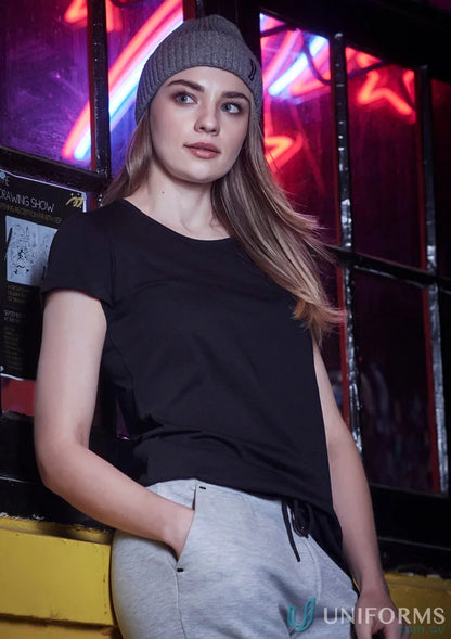 Woman in black T-shirt and gray beanie wearing Womens Streetworx Tee Shirt made of lightweight cotton