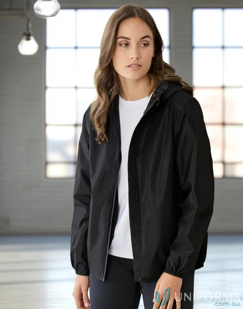 Woman wearing a black Womens Tempest Jacket with biz tech™ waterproof and tech™ breathability rating