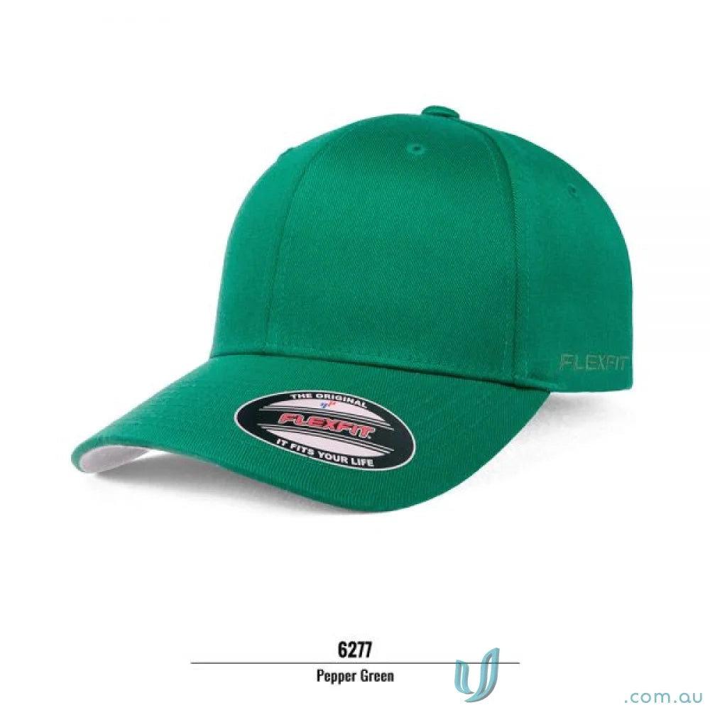 Green fitted baseball cap with Flexfit technology from Worn By The World Cap line